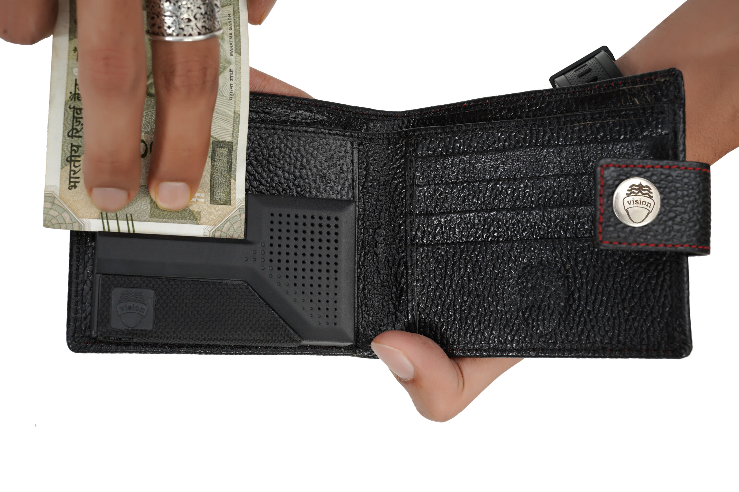 on opening the wallet there is a hard plastic device attached on the right side of the wallet.
