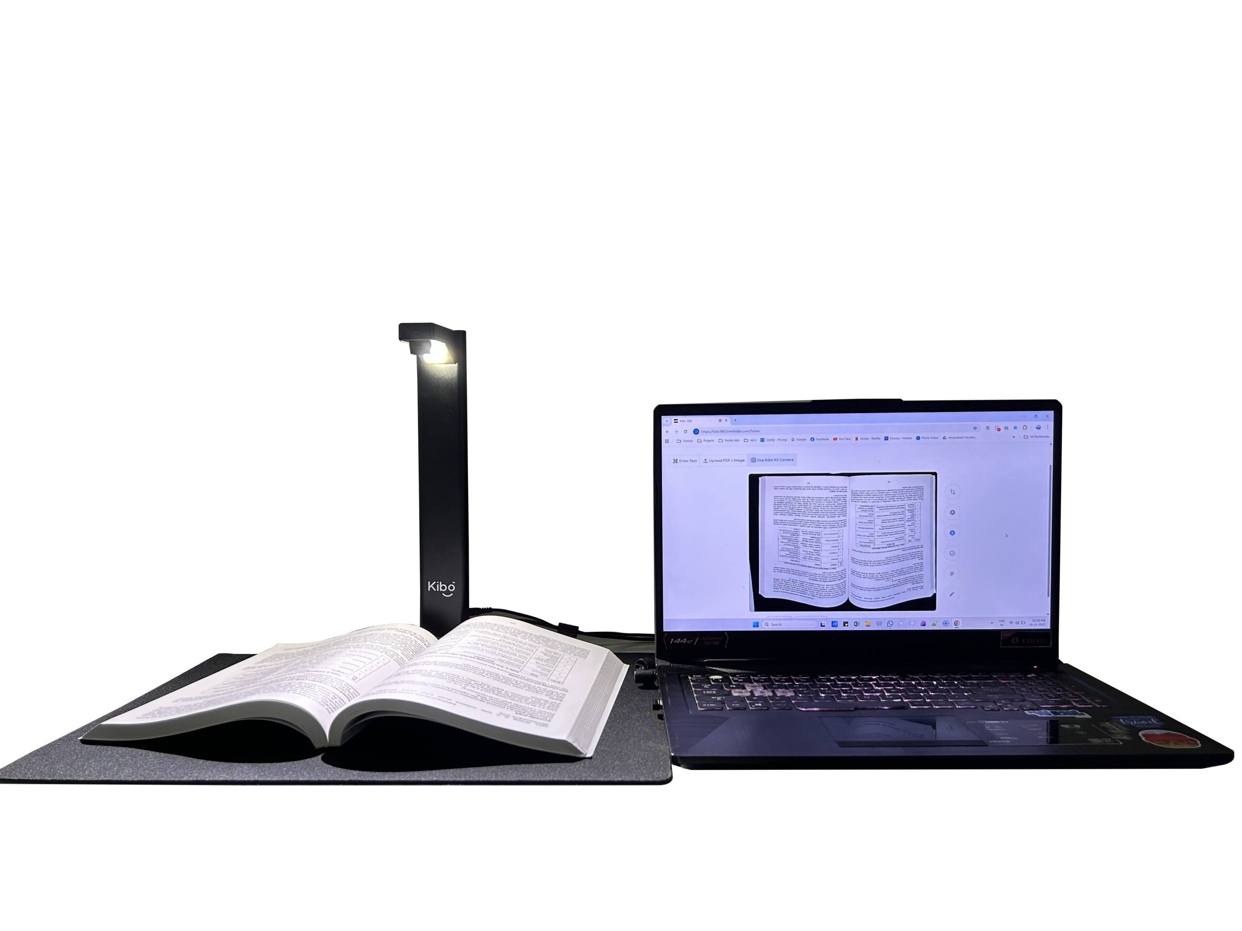 Kibo 2.0 Kit with a book placed open on the soft mat area and device connected with a Laptop