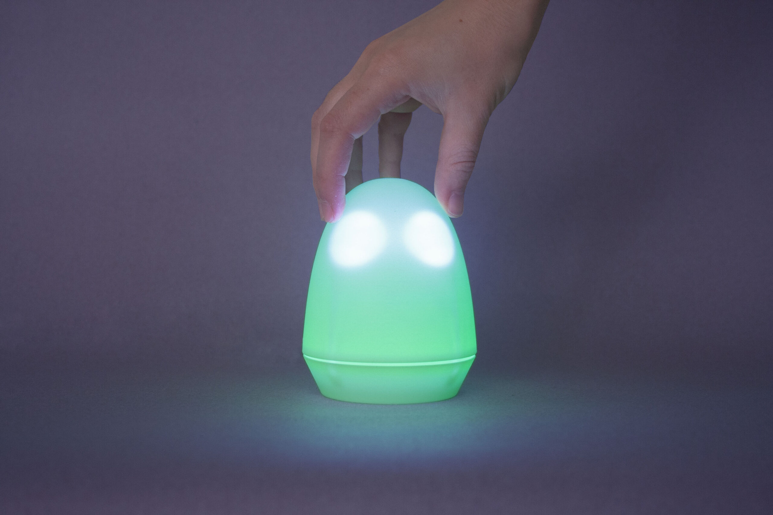 Showing Felix as a nice green light-giving egg-shaped robot with eyes